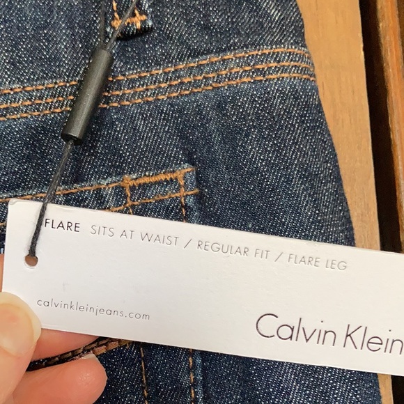 Calvin Klein flare jean sits at waist regular fit flare leg size 31 12 - Picture 12 of 17
